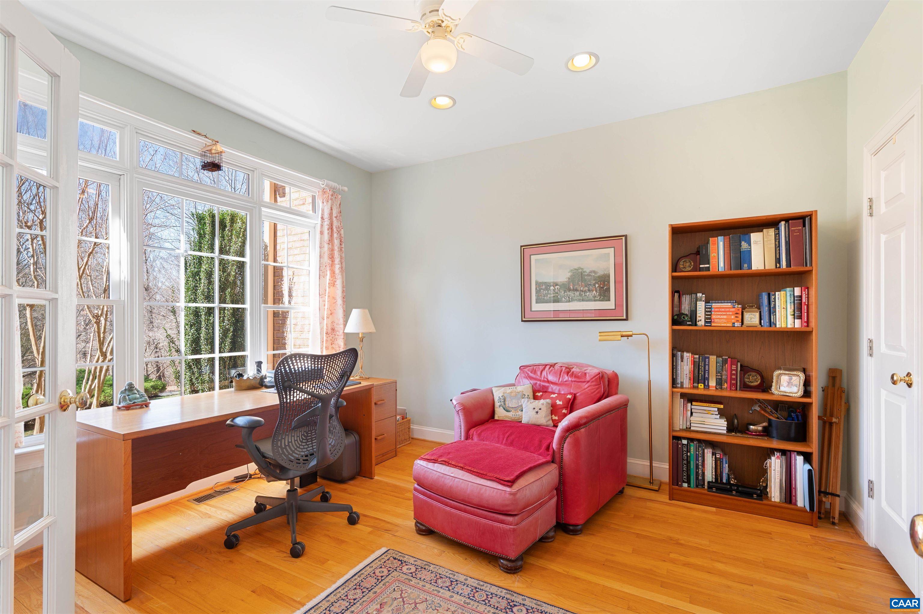 891 Old Ballard Road Charlottesville, VA 22901 - Photo 7 of 49 a living room with furniture a rug and a large window