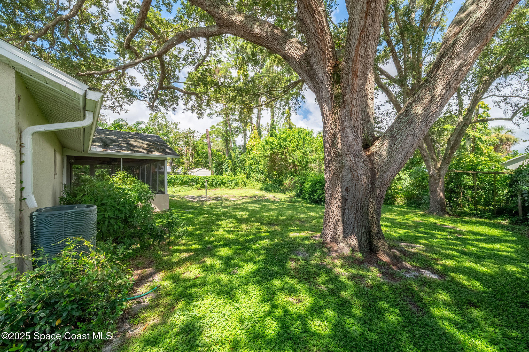 7081 Bayfront Road Cocoa, FL 32927 - Photo 24 of 45 a view of a yard in front of house