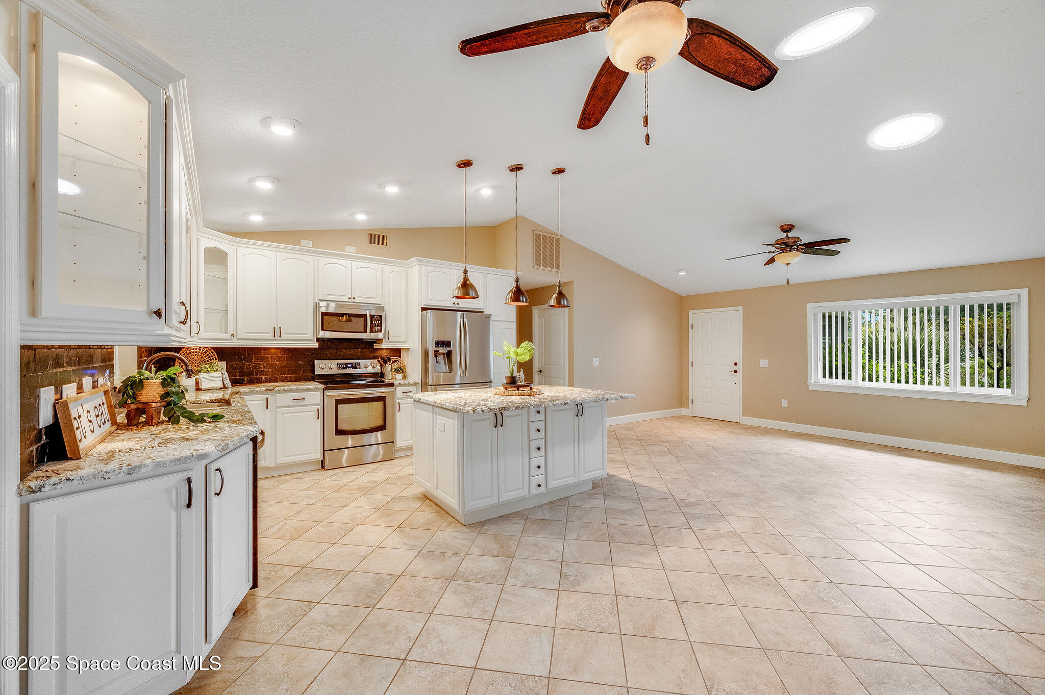 7081 Bayfront Road Cocoa, FL 32927 - Photo 5 of 45 a kitchen with a cabinets and counter space