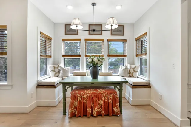 a view of living room filled with furniture and window
