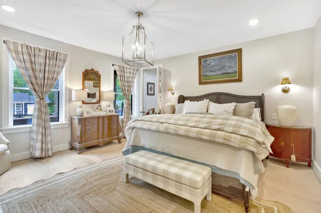 a room with a book shelf and a wooden floor