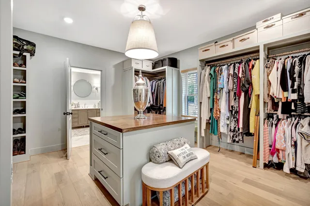 a bathroom with a vanity and a mirror
