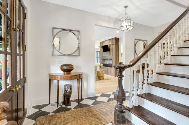 a view of entryway with wooden floor