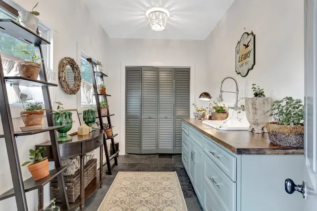 a view of a backyard with sitting area