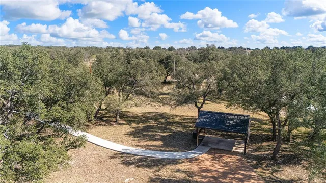 a view of a bench in a yard