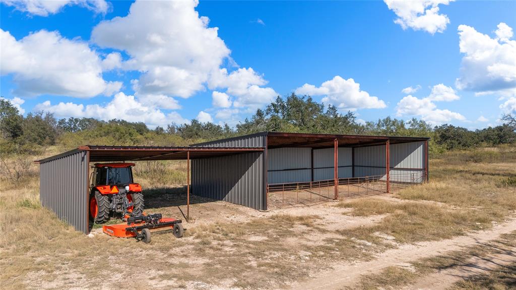 10652 Corbell Road Brady, TX 76825 - Photo 25 of 38 a view of a backyard with a hardwood