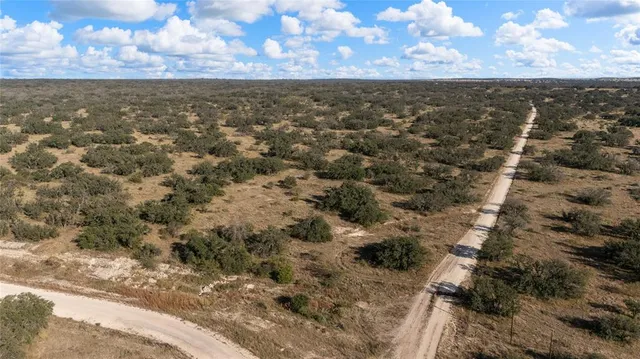 a view of residential houses with outdoor space