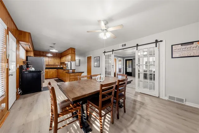 a view of a dining room with furniture