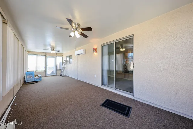 a view of a livingroom with entryway