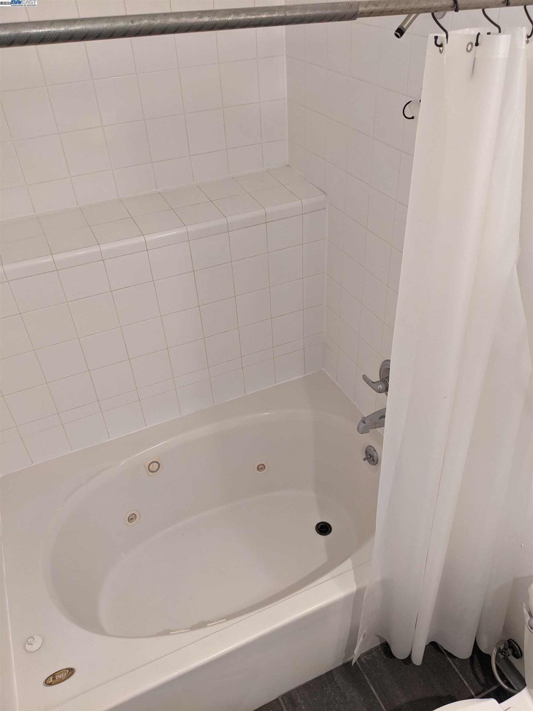 2622 Kingsland Avenue Oakland, CA 94619 - Photo 23 of 29 a bathroom with a bathtub