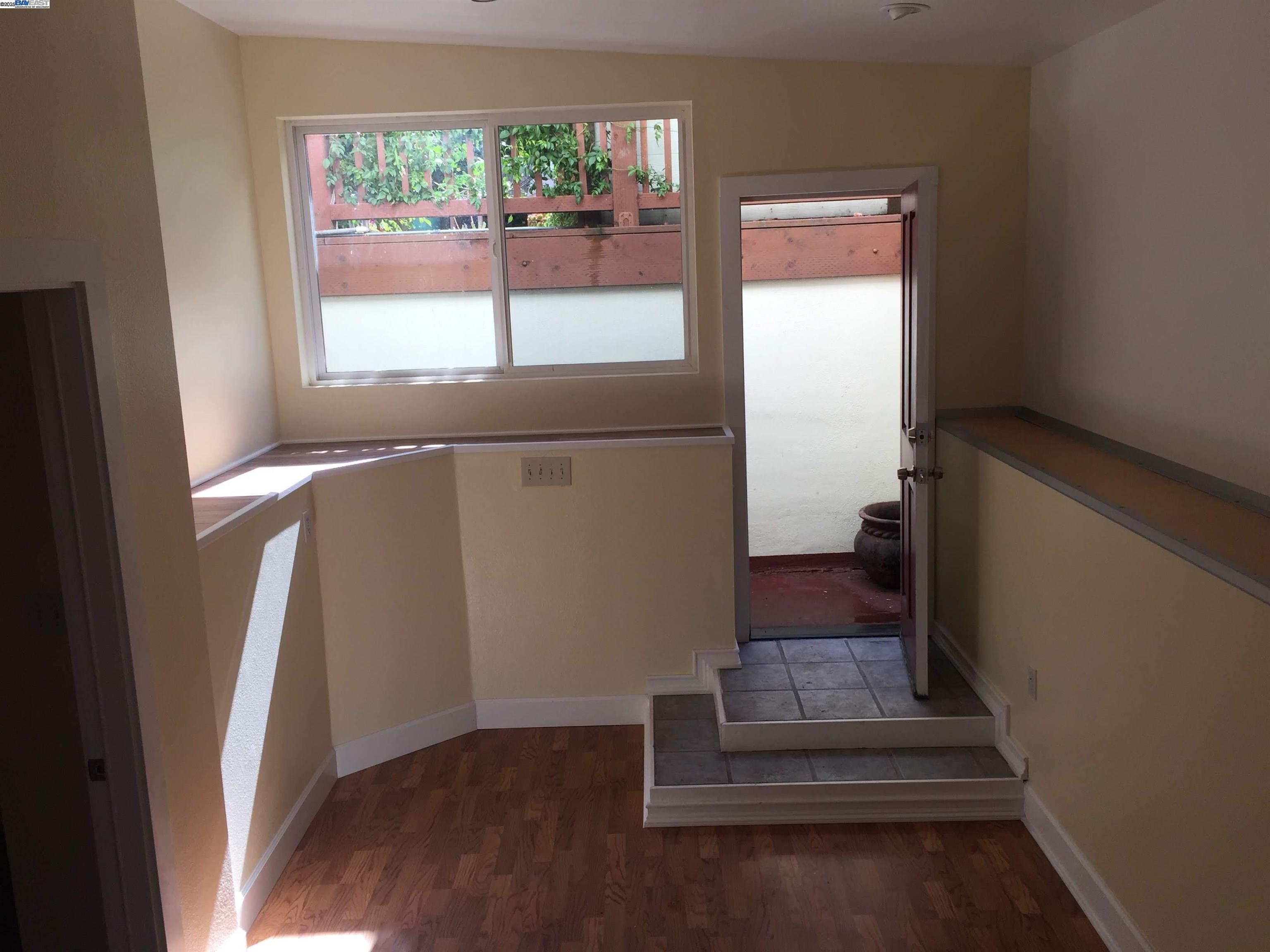 2622 Kingsland Avenue Oakland, CA 94619 - Photo 9 of 29 a view of entryway with wooden floor and window