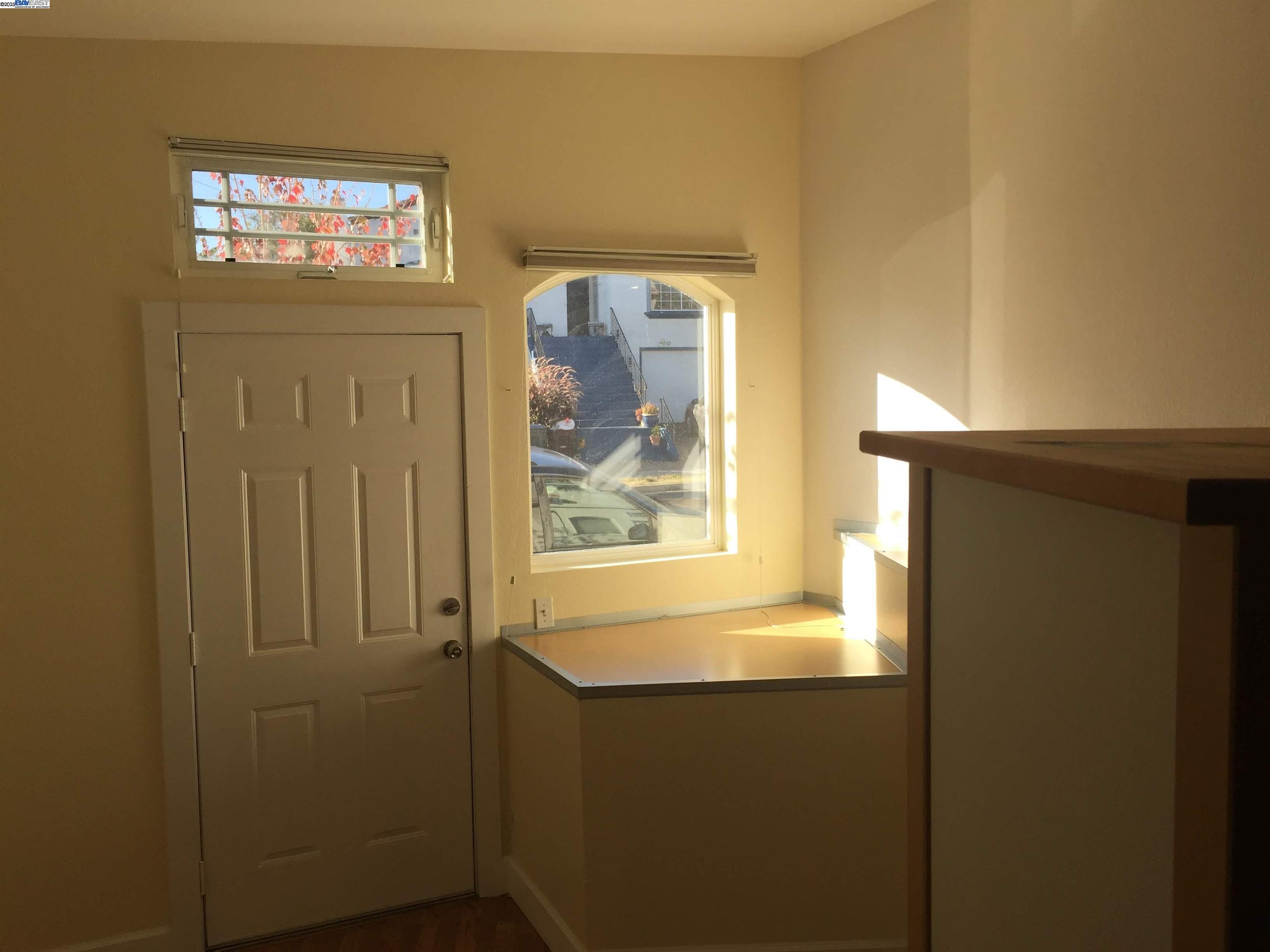 2622 Kingsland Avenue Oakland, CA 94619 - Photo 10 of 29 a bathroom with a bathtub and a window