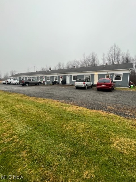 1724 Youngstown Kingsville Road, Unit 4 Vienna, OH 44473 - Photo 2 of 11 View of uncovered parking lot