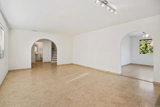 a view of a livingroom with a staircase