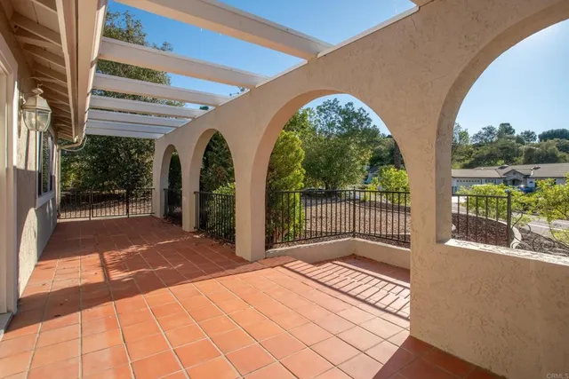 a view of a large building with a porch