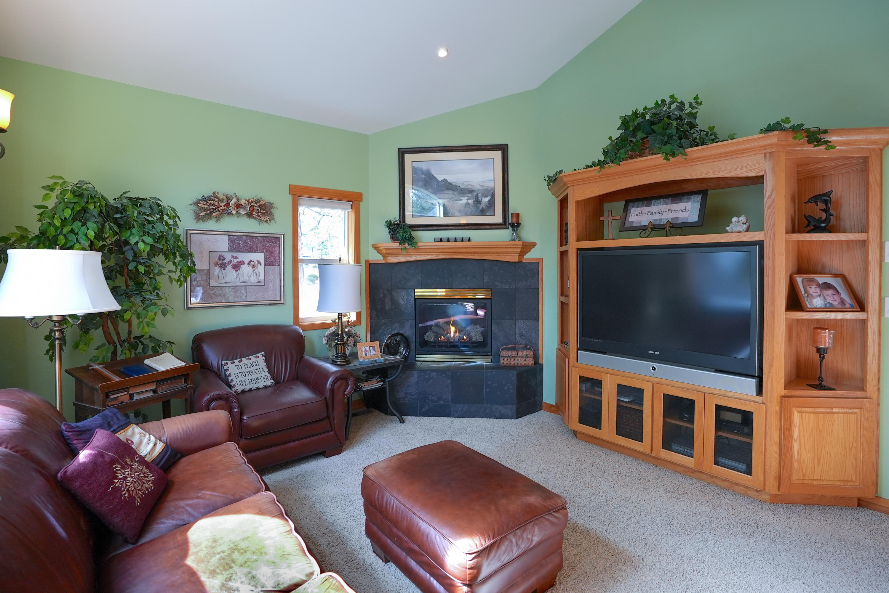 60709 Golf Village Loop Bend, OR 97702 - Photo 23 of 45 Office with fireplace and entertainment cabinets built in on main floor