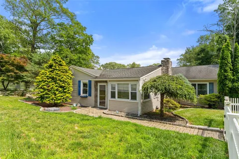 front view of house with a yard