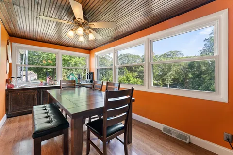 a view of dining room with furniture window and outside view