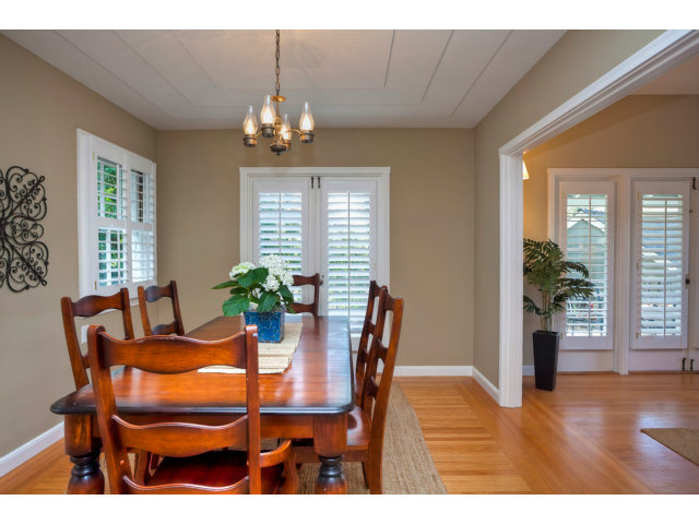 406 Edgewood Road San Mateo, CA 94402 - Photo 19 of 24 a view of a dining room with furniture window and wooden floor