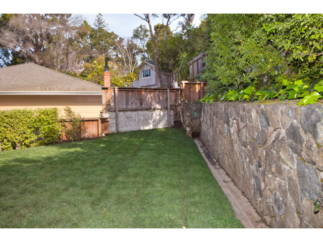 406 Edgewood Road San Mateo, CA 94402 - Photo 21 of 24 a view of a backyard with a garden