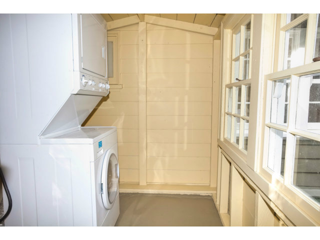 406 Edgewood Road San Mateo, CA 94402 - Photo 22 of 24 a view of a bathroom with a sink and a window