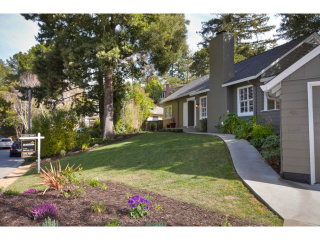406 Edgewood Road San Mateo, CA 94402 - Photo 3 of 24 a house view with a garden space