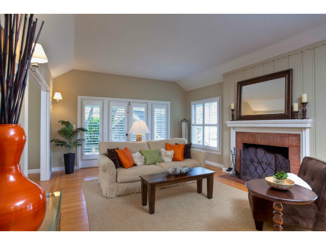 406 Edgewood Road San Mateo, CA 94402 - Photo 6 of 24 a living room with furniture and a fireplace