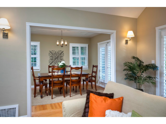 406 Edgewood Road San Mateo, CA 94402 - Photo 8 of 24 a living room with furniture potted plant and a window