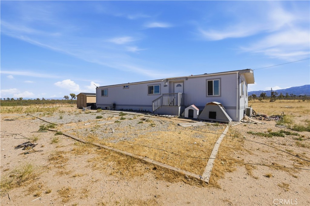 5885 Dos Palmas Road Phelan, CA 92371 - Photo 2 of 40 a view of a terrace view