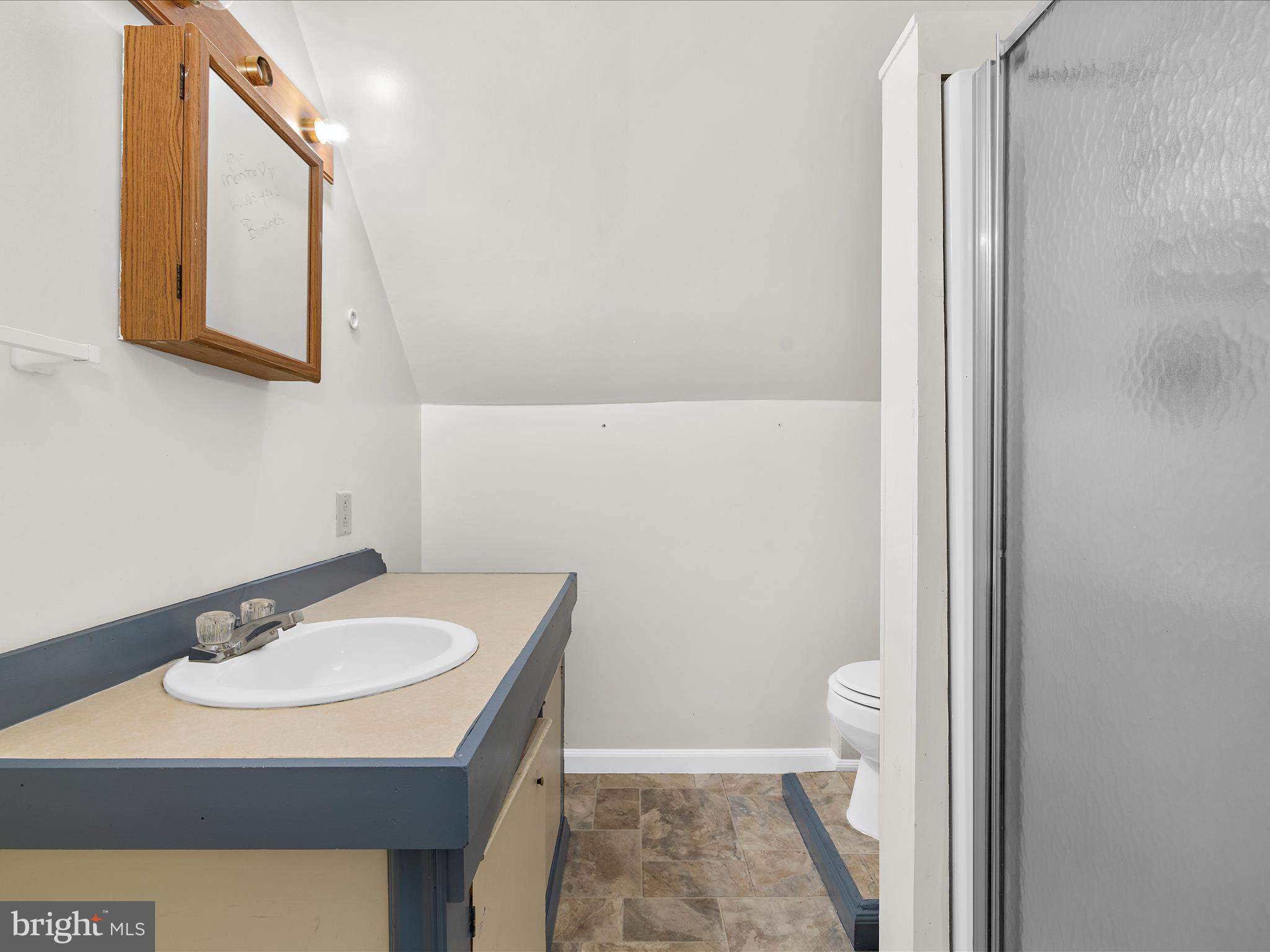 812 Roe Road Barclay, MD 21607 - Photo 20 of 46 a bathroom with a sink toilet and mirror