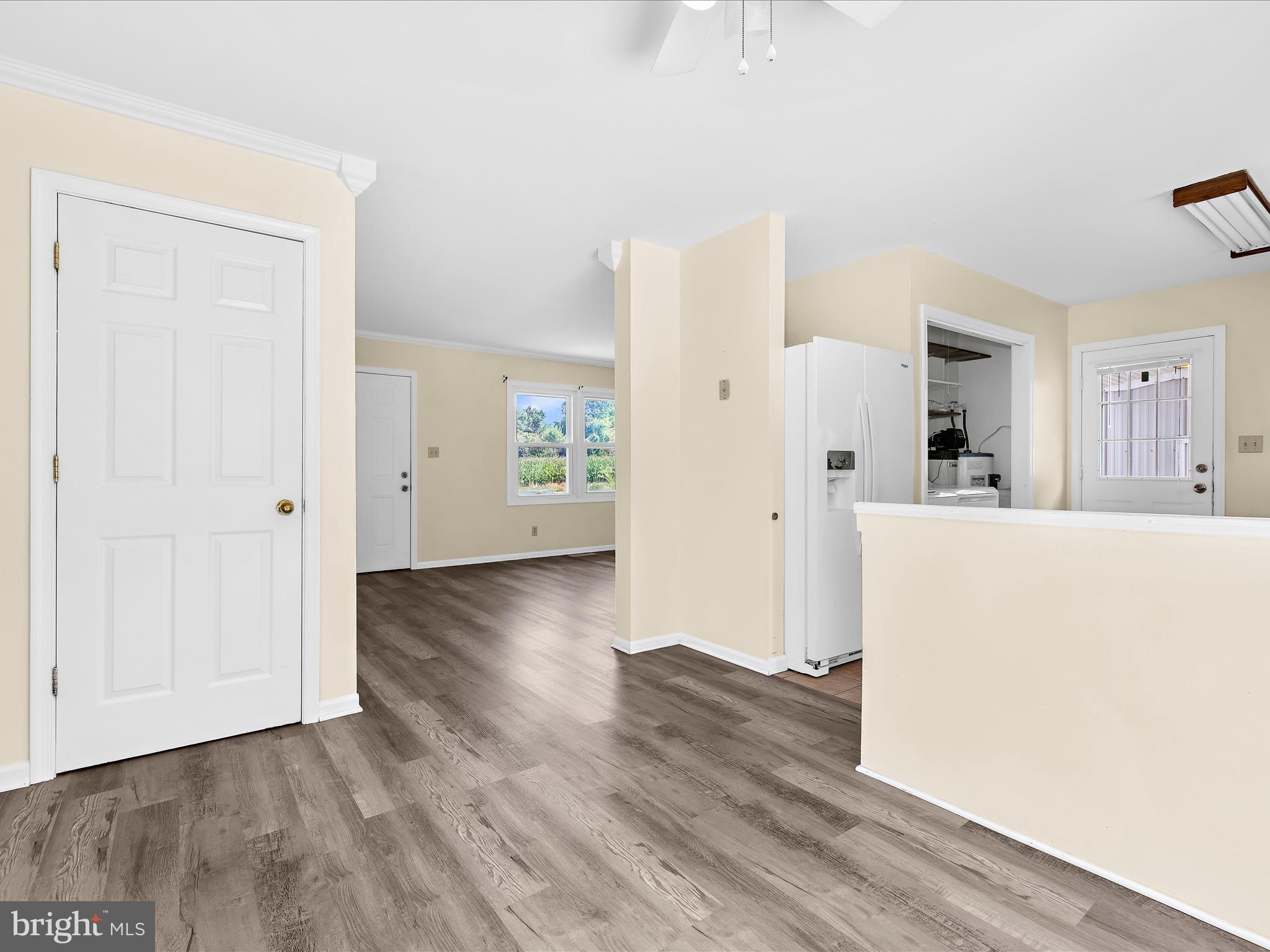 812 Roe Road Barclay, MD 21607 - Photo 24 of 46 a view of a kitchen with refrigerator and wooden floor