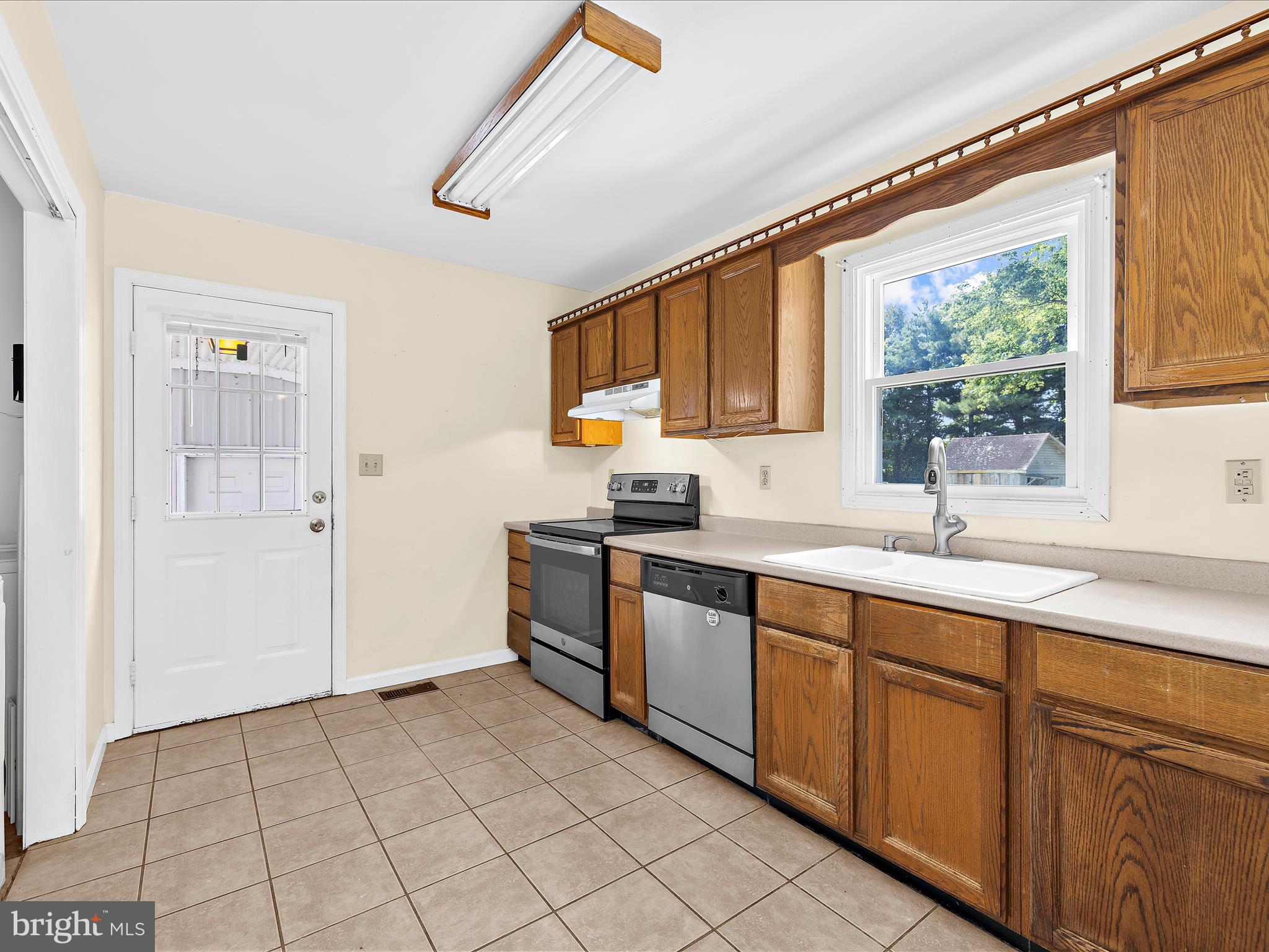 812 Roe Road Barclay, MD 21607 - Photo 25 of 46 a kitchen with a sink cabinets and window