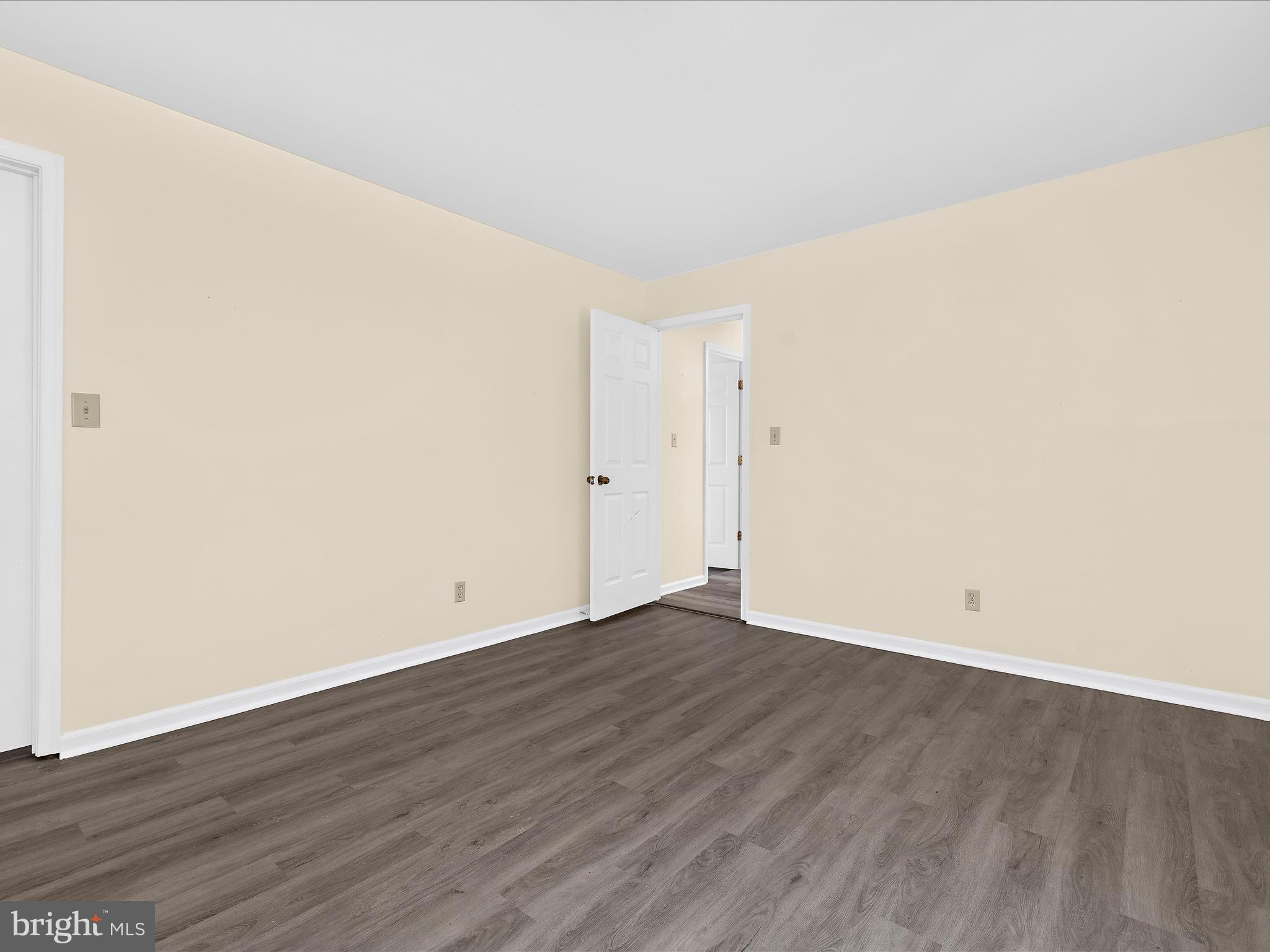 812 Roe Road Barclay, MD 21607 - Photo 7 of 46 an empty room with wooden floor