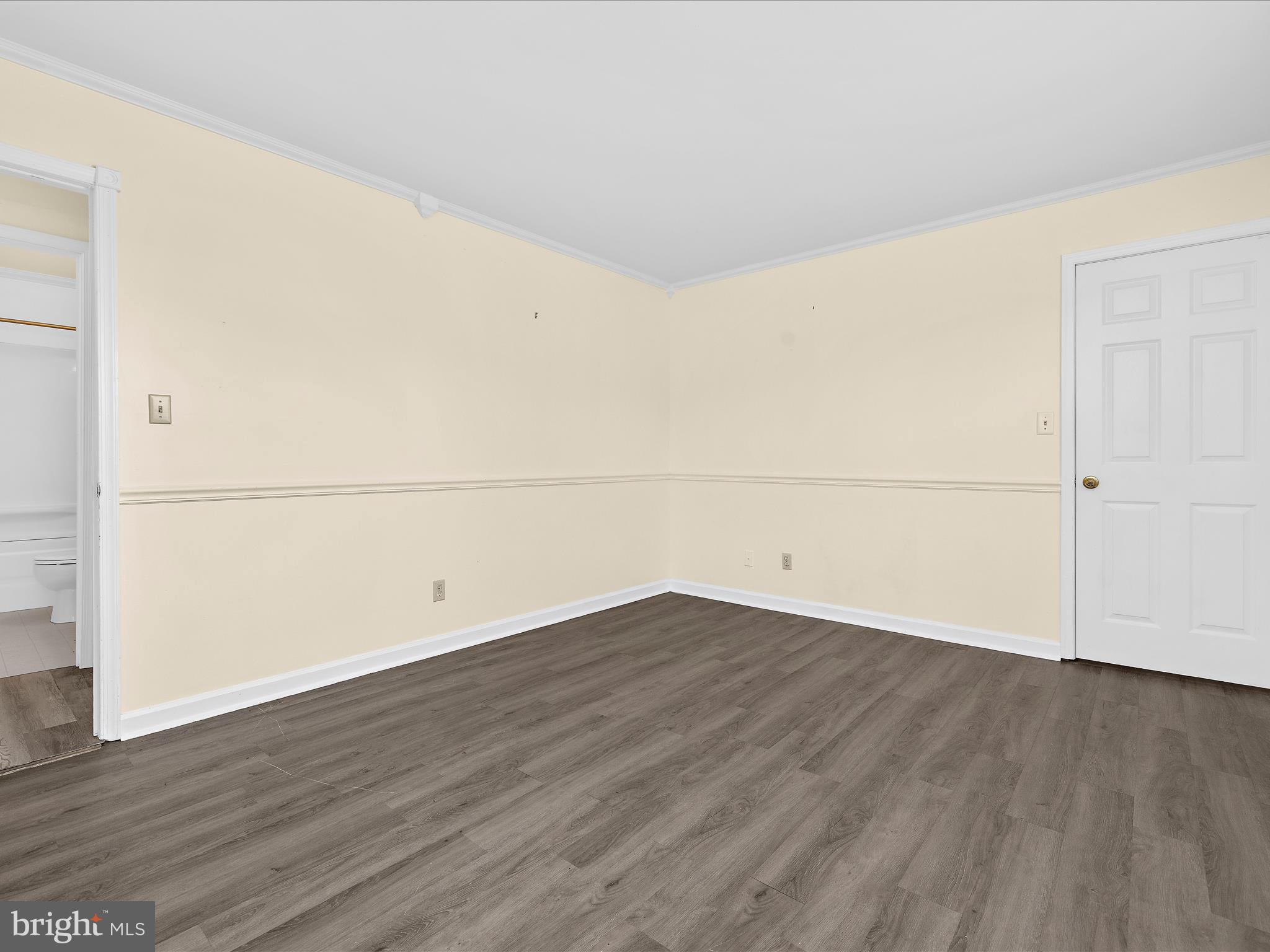 812 Roe Road Barclay, MD 21607 - Photo 10 of 46 an empty room with wooden floor