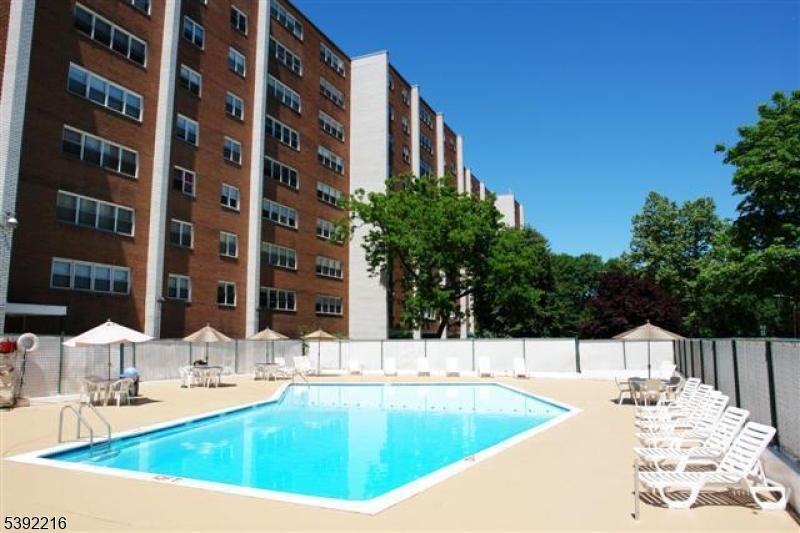 39 East 39th Street Paterson, NJ 07514 - Photo 3 of 15 a view of swimming pool with outdoor seating