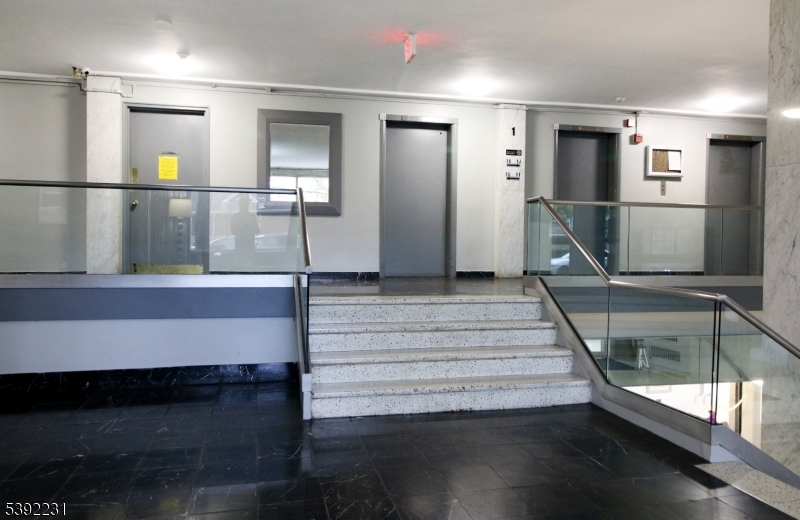 39 East 39th Street Paterson, NJ 07514 - Photo 8 of 15 a view of entryway and hall with wooden floor