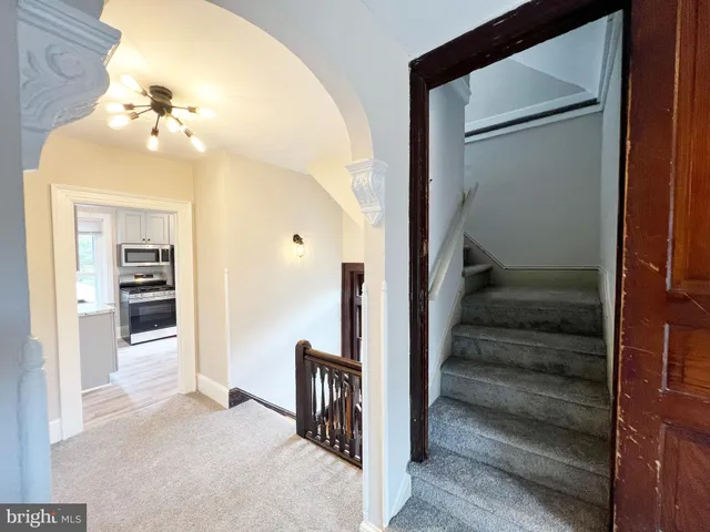 a view of a storage & utility room with washer and dryer