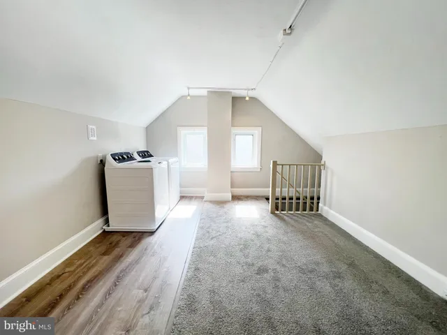 a view of a house with a street