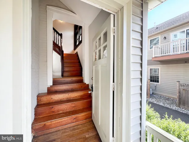 a view of entryway with a front door