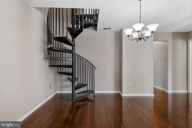 a view of entryway with wooden floor