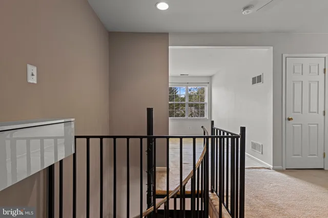 a view of a porch with wooden floor