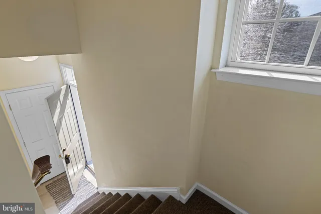 a view of balcony with wooden floor
