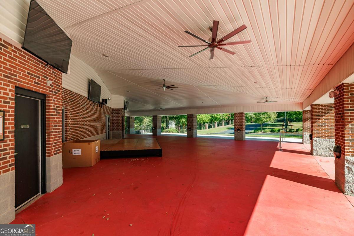 225 Oak Street, Unit 104 Athens, GA 30601 - Photo 24 of 27 a view of a porch with furniture and a yard