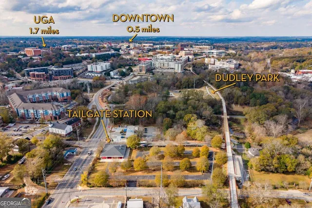a view of a swimming pool with a table and chairs
