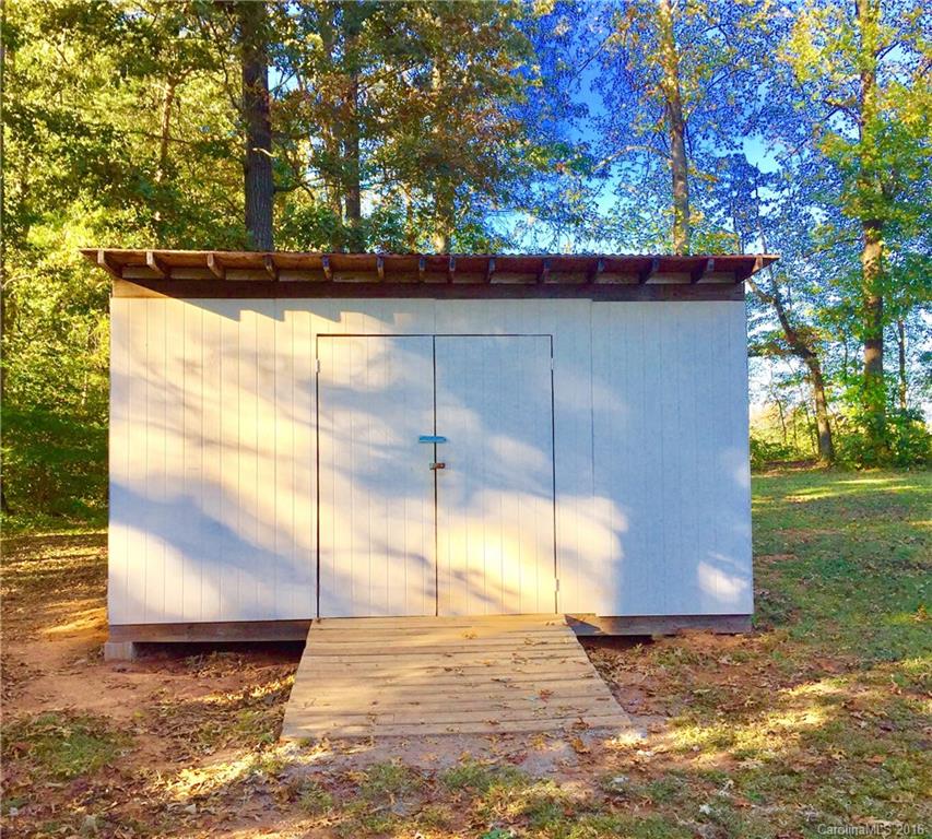 119 Forney Road, Unit 1 Olin, NC 28660 - Photo 14 of 17 a view of a back yard of the house