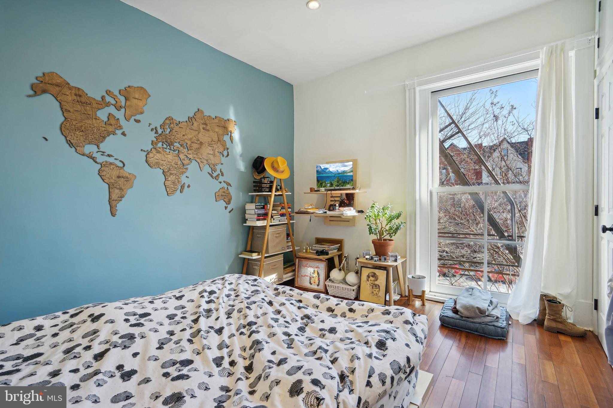 1101 P Street Northwest Washington, DC 20005 - Photo 22 of 50 Bright bedroom with blue accent wall