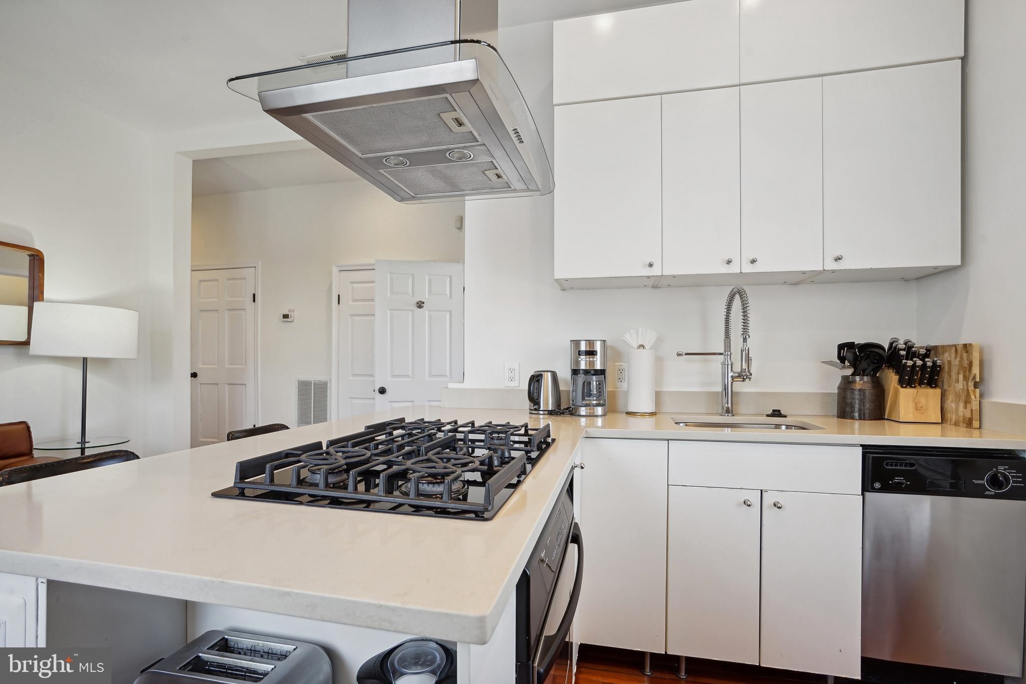 1101 P Street Northwest Washington, DC 20005 - Photo 30 of 50 Quartz counters wrap around kitchen