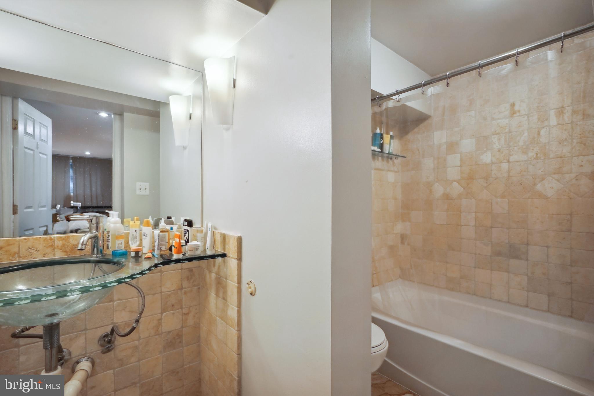 1101 P Street Northwest Washington, DC 20005 - Photo 43 of 50 Travertine bathroom