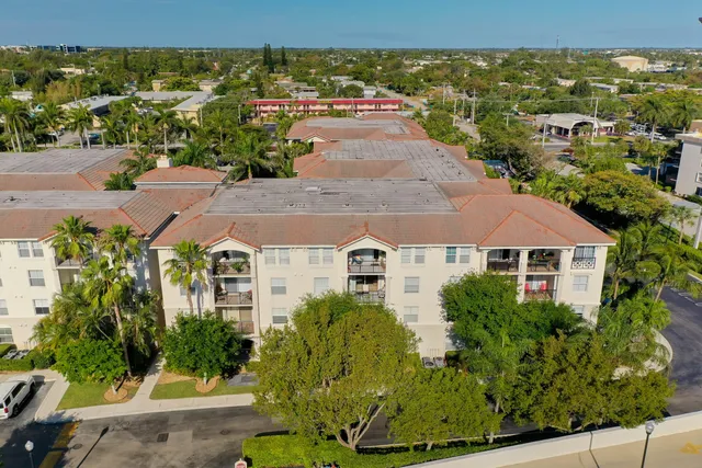 a view of a kitchen with a sink and cabinet