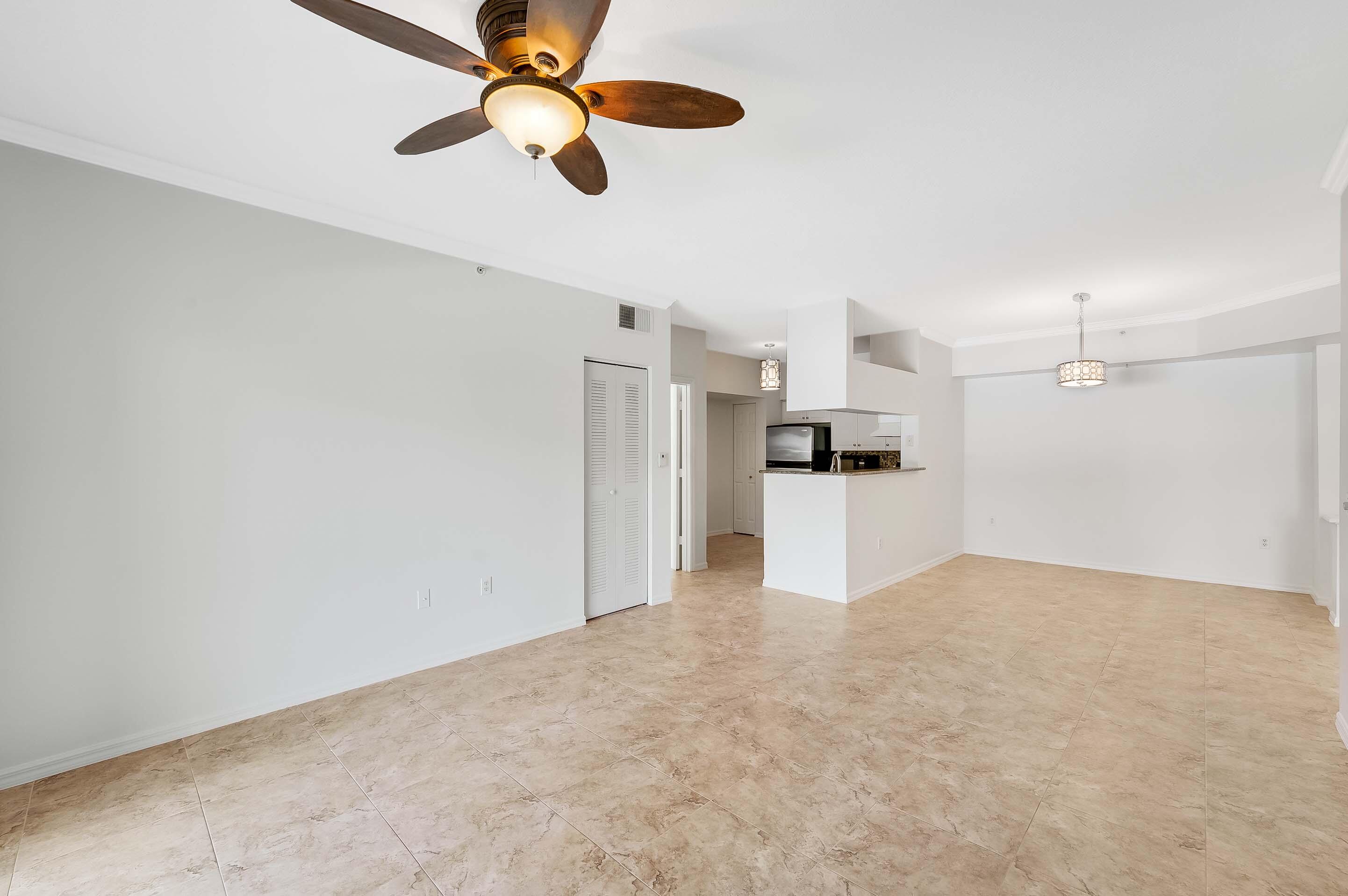 3115 Tuscany Way Boynton Beach, FL 33435 - Photo 20 of 49 a view of a kitchen with a sink and cabinet